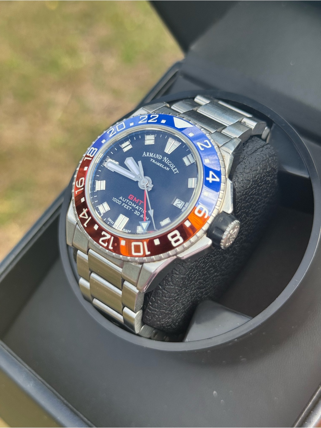 Armand Nicolet Gmt Stainless Steel Watch With Blue  Red Bezel